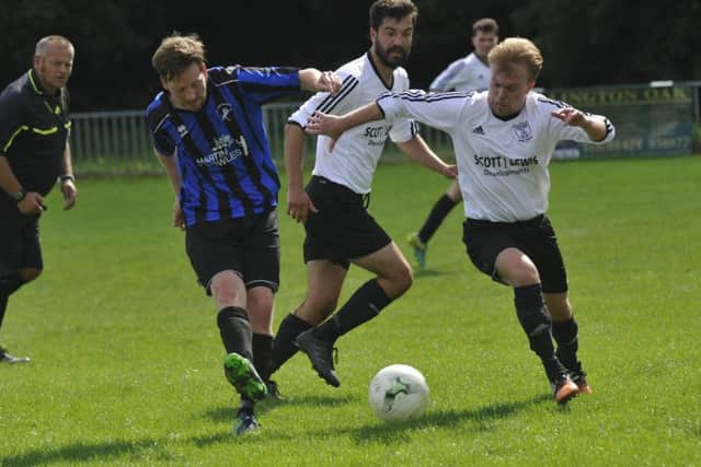 Midfield action from the Hollington United II versus Bexhill United II game.