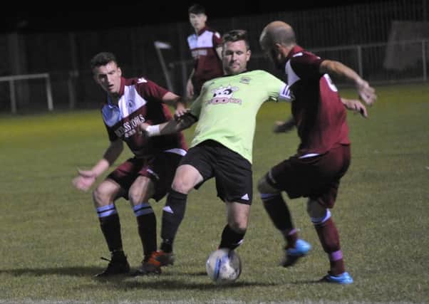 Little Common duo Liam Ward and Russell Eldridge combine to win possession. Pictures by Simon Newstead