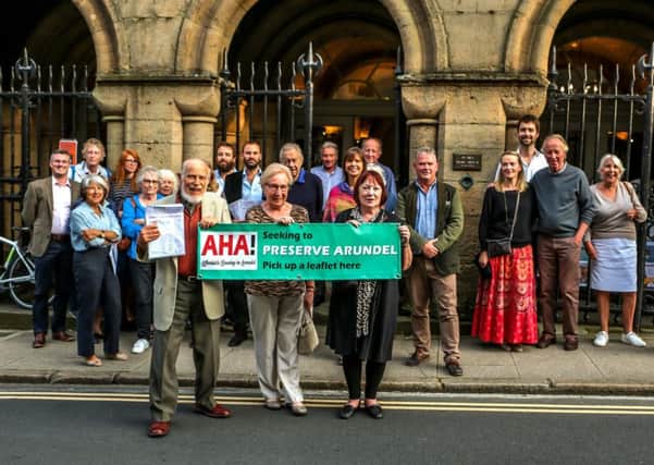 Campaigners demonstrating against the flats outside Arundel Town Hall