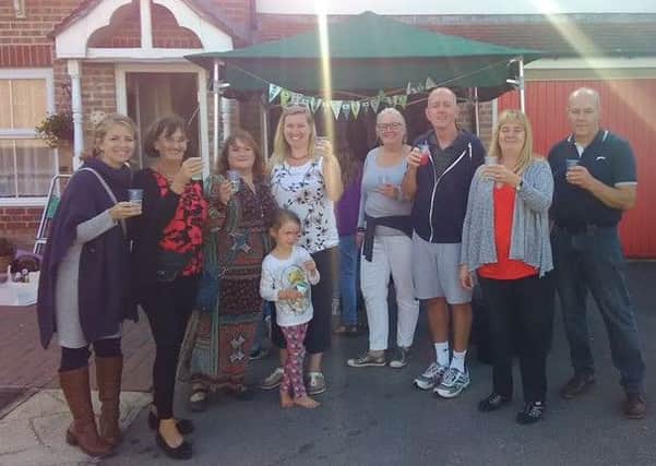 Naomi Squires hosted a street party to raise money for Macmillan. From left to right: Claire, Dee, Sarah, Lacey Squires, Naomi Squires, Caroline, Andrew, Judy and Martin