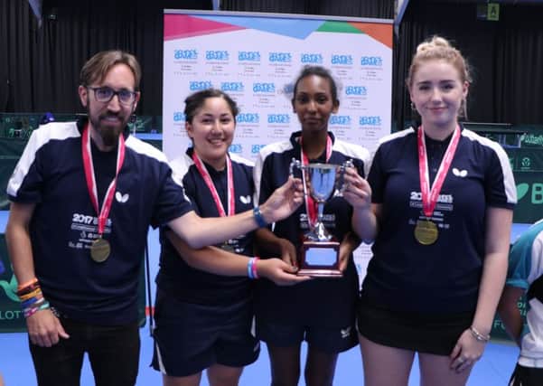 The South East girls team receive their winners' trophy at the School Games in Loughborough.
From left: Andrew Battley (team manager), Isabelle Joubeily, Sarah Menghistab, Kate Cheer. Picture by Paul Stimpson SUS-171109-171145002