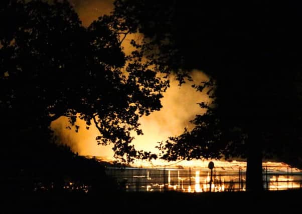 Fire rages at farm in Burgess Hill.