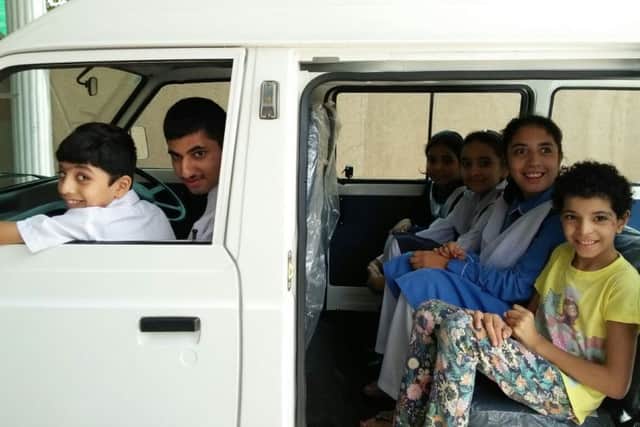 Children in Islamabad, in one of the vans provided by the LOAF porject thanks to generosity of churches and individuals in the Hastings area,
