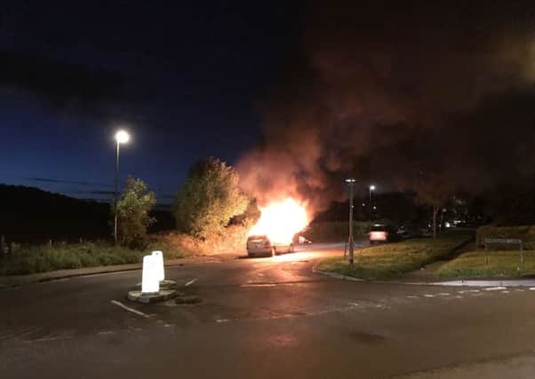 A car was ablaze in Lancing last night. Picture: Michael Funnell