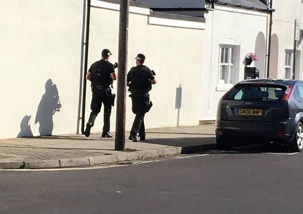 Armed police have been seen in Worthing this morning. Pictures: Oli Welbz