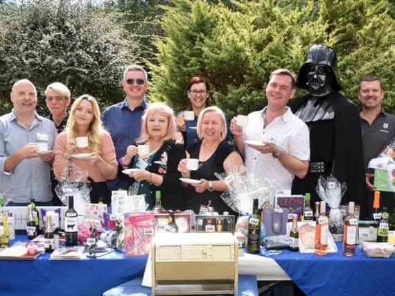 Staff, Supporters and a few familiar faces share a cuppa at The Sussex Beacons Summer fete (Credit: Nick Ford Photography)