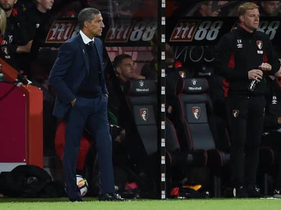 Brighton & Hove Albion boss Chris Hughton and Bournemouth counterpart Eddie Howe on the sideline. Pictures by PW Sporting Pics