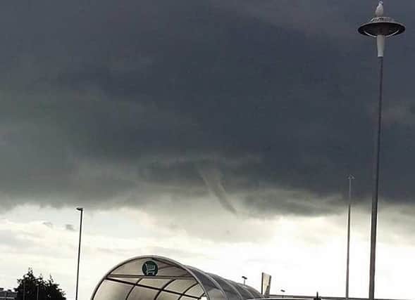 The mini tornado as seen above the car park at Morrisons in Lottbridge Drove, Eastbourne. Picture by Hannah Buss