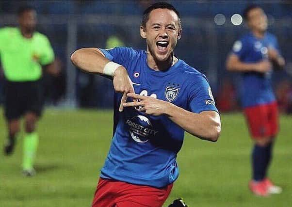 Darren Lok in action for Johor Darul Takzim