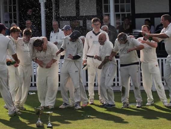 Littlehampton celebrate after retaining their WSICL T20 Cup crown on Sunday.