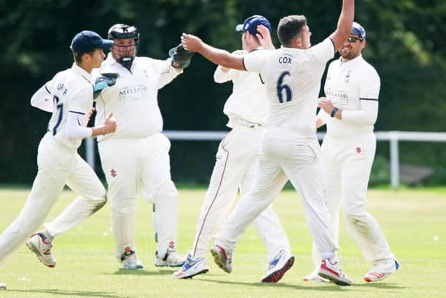 Littlehampton celebrate on their way to winning the WSIL Division 1 title at Arundel on the final day of the season. Picture by Derek Martin DM1790291