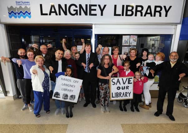 Councillor Alan Shuttleworth with residents campaigning against the closure of Langney Library in Eastbourne (Photo by Jon Rigby) SUS-170914-103233008