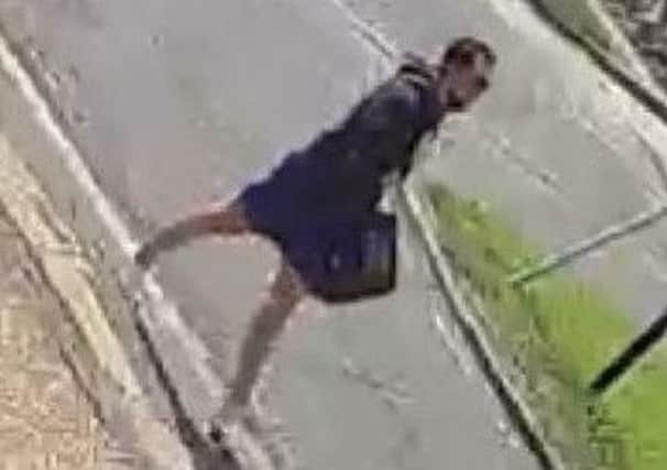 CCTV image released by Surrey Police following an indecent exposure in Horley SUS-170919-153025001