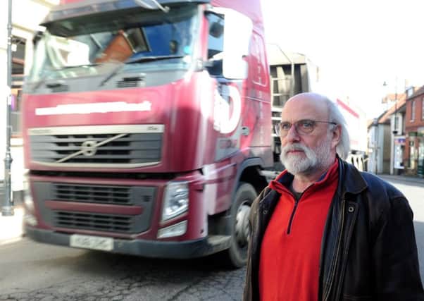 Resident Steve Morley concerned by the increasing number of lorries going through Midhurst earlier this year. ks170127-2