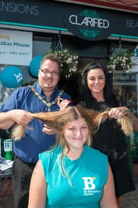 Left to right: the mayor of Littlehampton, cllr Billy Blanchard-Cooper, Georgina O'Mara (before her head is shaved) and Clare-Louise Diggins, the owner of Clarified Extensions and Beauty