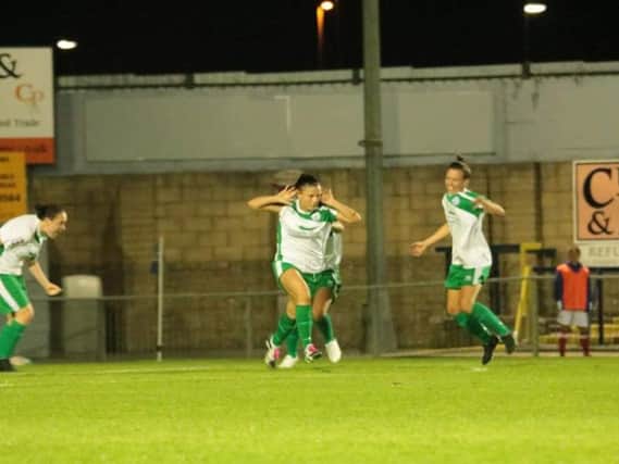Charley Wilson-Blakely celebrates scoring against her old club for Chi City Ladies