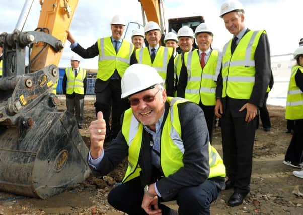 Ground breaking at the site of the new Broadbridge Heath Lesiure centre. Jonathan Chowen (cabinet member for Leisure and Culture) gives a thumps up
Pic Steve Robards SR1723645 SUS-170921-163727001