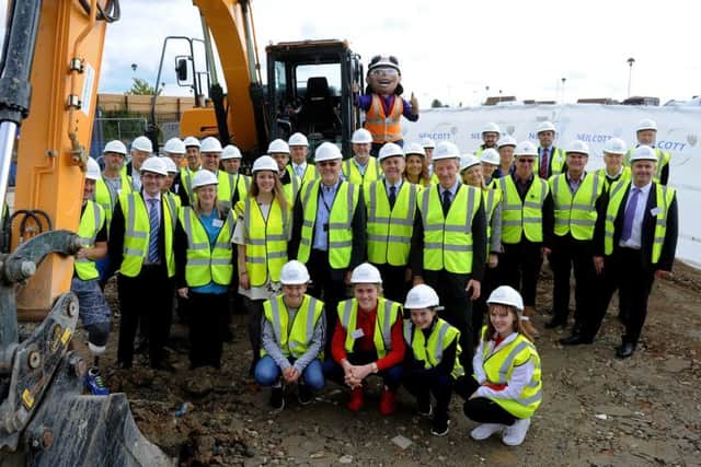 Ground breaking at the site of the new Broadbridge Heath Lesiure centre. Jonathan Chowen (cabinet member for Leisure and Culture) gives a thumps up
Pic Steve Robards SR1723634 SUS-170921-163644001