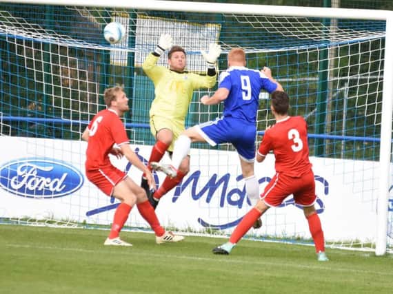 Trevor McCreadie scores one of his four goals. Picture by Grahame Lehkyj