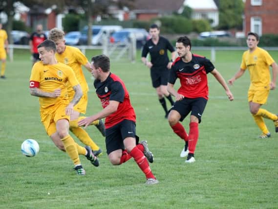Action from Lancing United's clash with Upper Beeding earlier this season. Picture by Derek Martin DM1792407