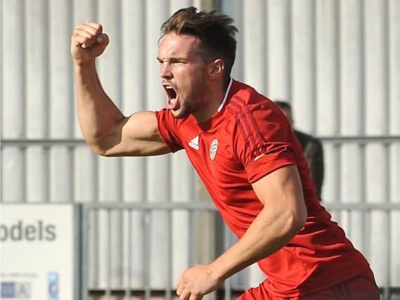 Lloyd Dawes celebrates scoring for Worthing earlier this season. Picture by Stephen Goodger