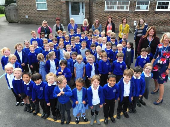 Staff and children at Lancastrian Infant School