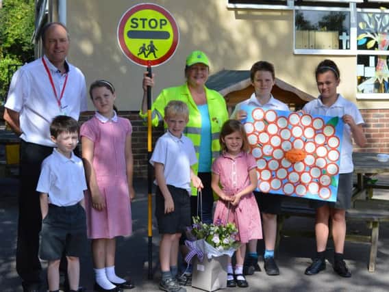 Tracey Nicholson has been the lollipop lady for St James' School, Coldwaltham, for 10 years