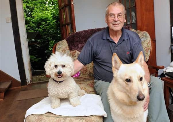 John Churchill was fined and received a criminal record for mess from his dog Shaka (right) that he cleared up. Picture: Stephen Goodger