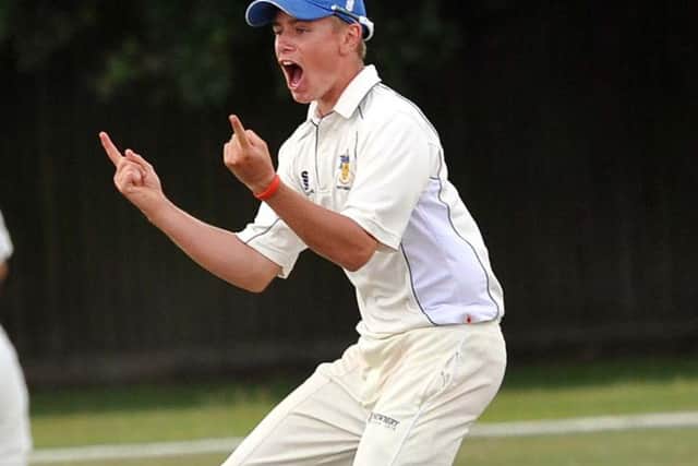 Mason Crane celebrates a wicket for Worthing in 2014. Picture by Stephen Goodger