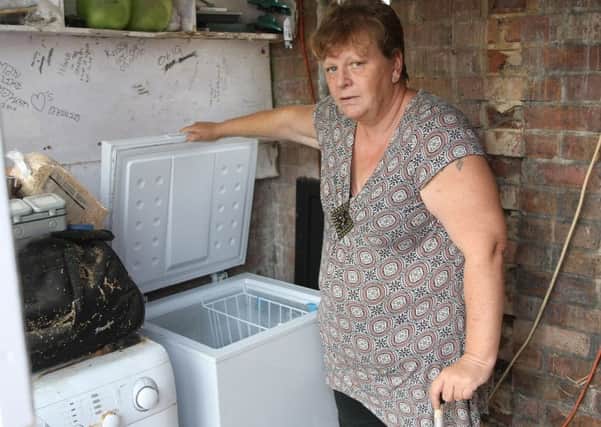 A power cut left Tina trapped in her own home and killed her fish. Picture: Derek Martin