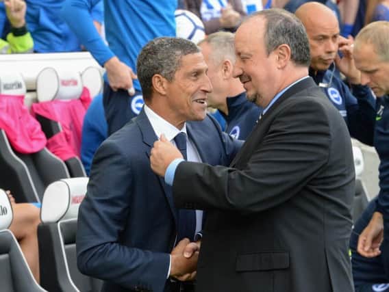 Albion boss Chris Hughton greets Newcastle manager Rafa Benitez on Sunday. Picture by Phil Westlake (PW Sporting Photography)