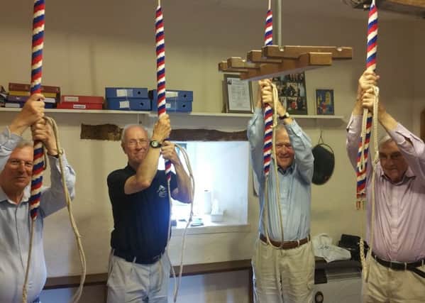 Bell-ringers demonstrate the hobby