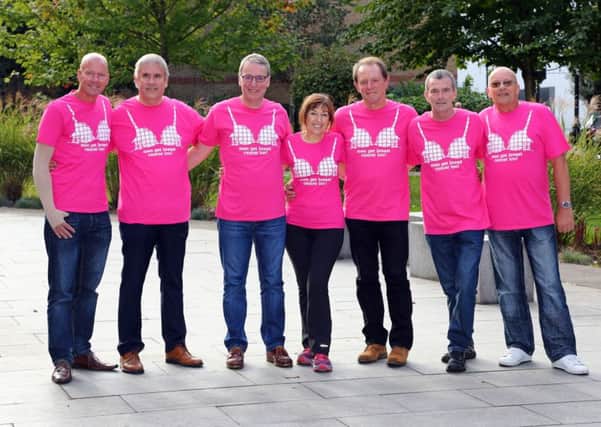 Roy Collins met with five other men who have suffered with breast cancer
