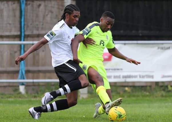 John Akoto challenges for the ball during Hastings United's 4-3 defeat at Molesey last weekend. Picture courtesy Scott White