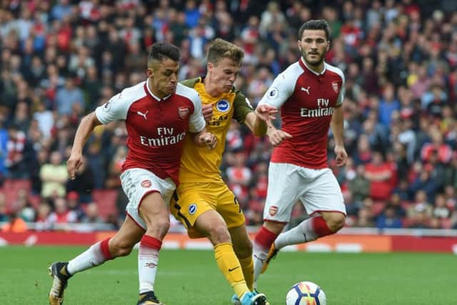 Solly March battles Alexis Sanches for possession. Picture by Phil Westlake (PW Sporting Photography)