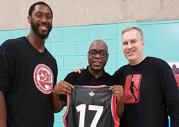 Eric Douglin (centre) with two members of the Toronto Knights. Picture courtesy Martin Webb Photography