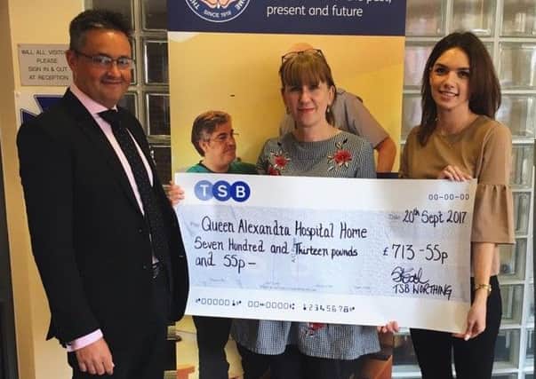 TSB Worthing present a cheque to The Queen Alexandra Hospital Home