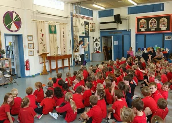 Former Olympian Amy Smith talks to pupils