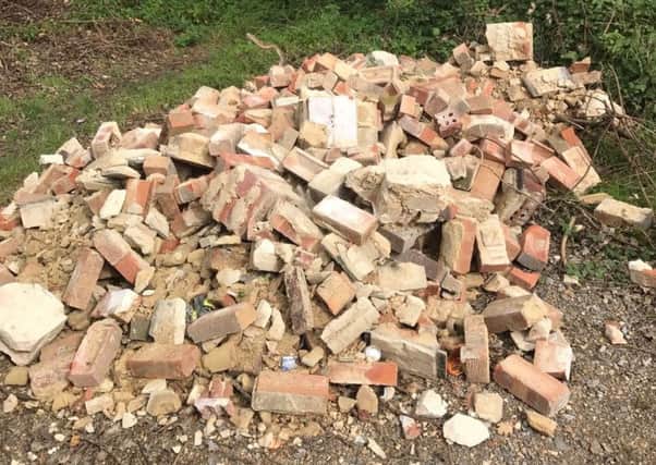 The huge pile of bricks dumped in Westbourne over the weekend