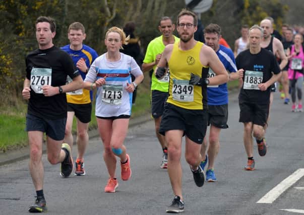 Runners make their way up Queensway in the 2017 Hastings Half Marathon. Picture by Justin Lycett