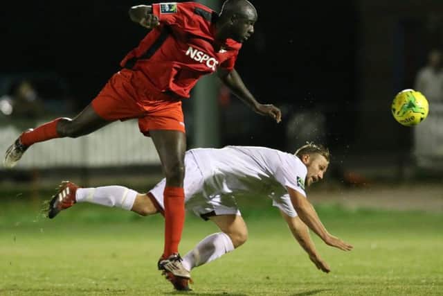 Sam Adams scraps for possession at The Pilot Field on Tuesday night. Picture courtesy Scott White