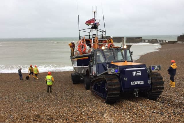 The lifeboat launching from the beach. Pictures by Justin Lyclett
