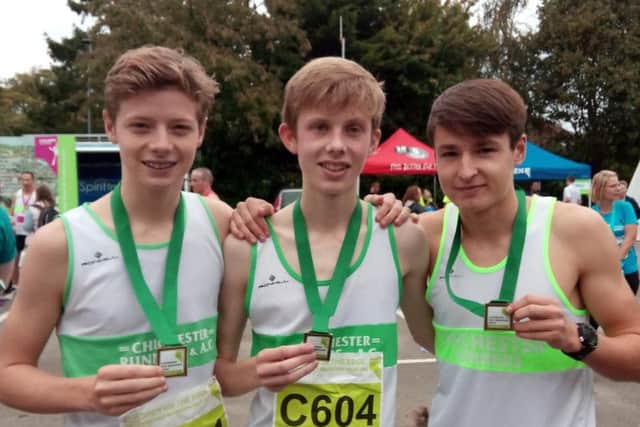 Leo Stallard, Ben Morton and Ethan Hartley of Chichester Runners - winners of the relay race in the Chichester Half Marathon