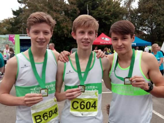 Leo Stallard, Ben Morton and Ethan Hartley of Chichester Runners - winners of the relay race in the Chichester Half Marathon
