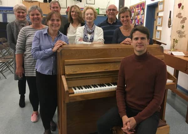 Joe Paxton, 27, with members of the Arun Choral Society at a rehearsal held in Arundel C Of E Primary School, Jarvis Road, Arundel