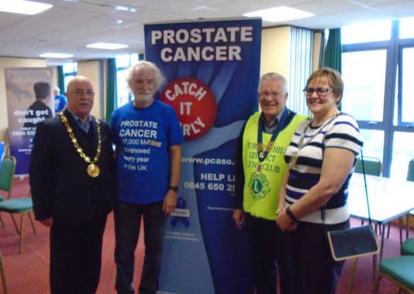 From left: Bruce Forbes, chairman of Mid Sussex District Council, Roger Bacon from Prostate Cancer Support Group, Lion president John Carter and town mayor Jacqui Landriani. Picture supplied by Tony Parris