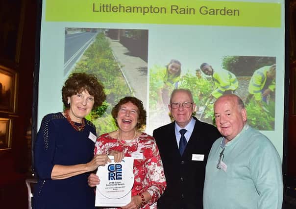 Lady Caroline Egremont presents the CPRE Sussex Countryside Awards' New Sussex Landscapes plaque to Angela Tester, Danny Surridge and Terry Ellis