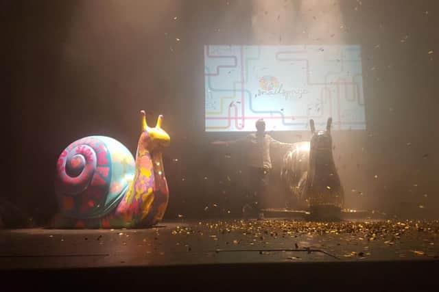 Norman Cook reveals the snail sculptures at the Theatre Royal