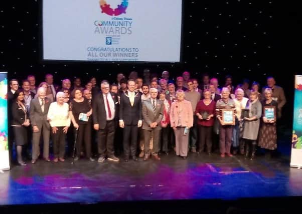 The Community Awards 2016 winners and sponsors gather on The Capitol Horsham stage