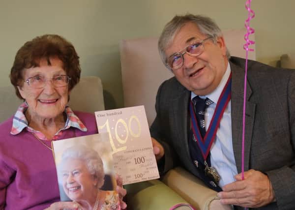 100 years young, Lily is pictured with deputy mayor, Nigel Sinden. SUS-170925-074404001